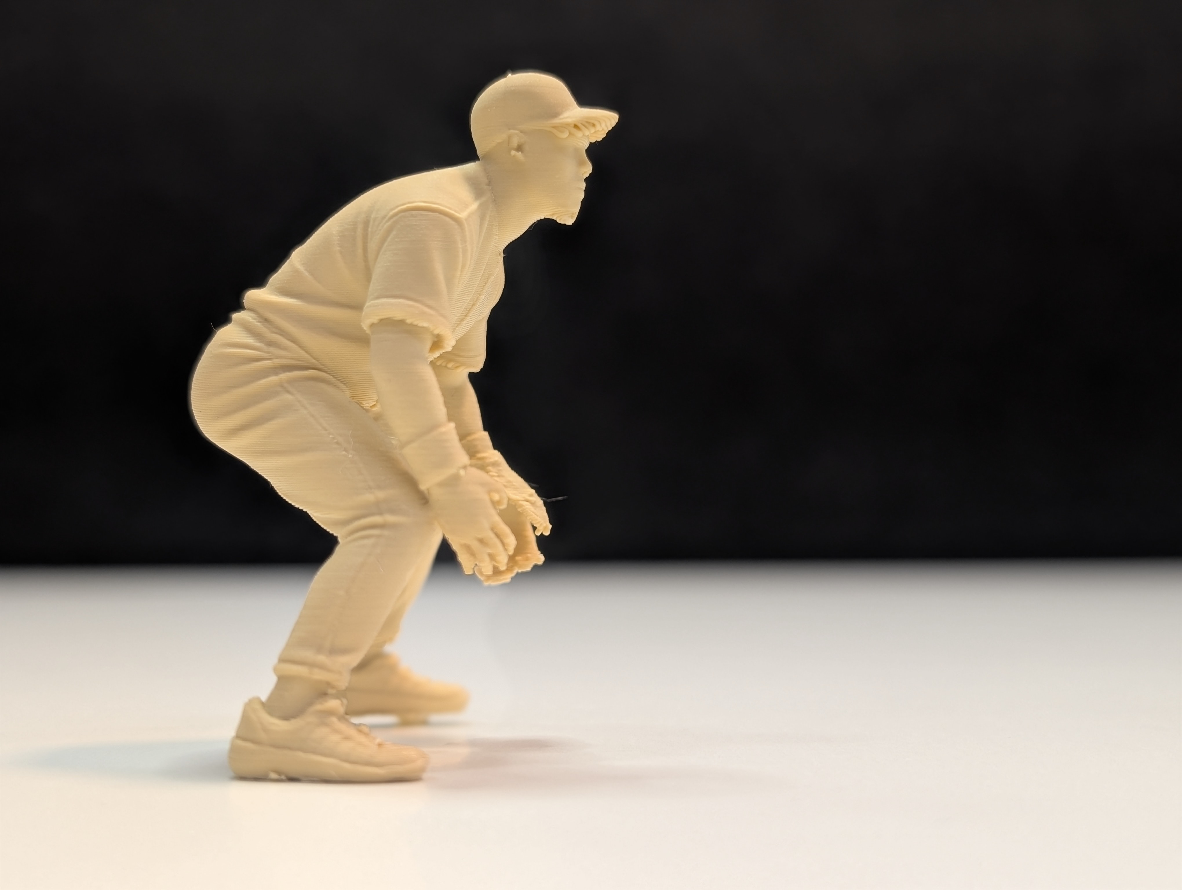 Infielder figurine in ready position